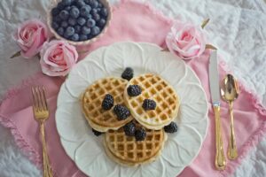 Waffles and berries make an easy breakfast using simple ingredients.