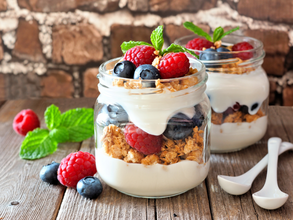 Yogurt parfait served in a mason jar.