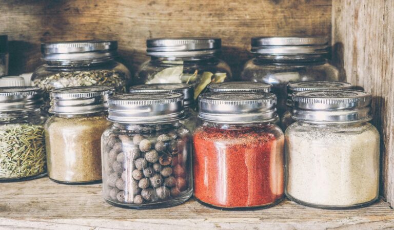 Rustic pantry with spice bottles